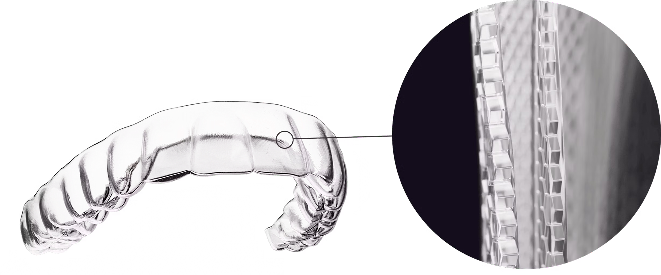 Clear dental impression tray with close-up of material texture on a white background